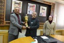 Photo of President ALMa’aitah honors the university football team
